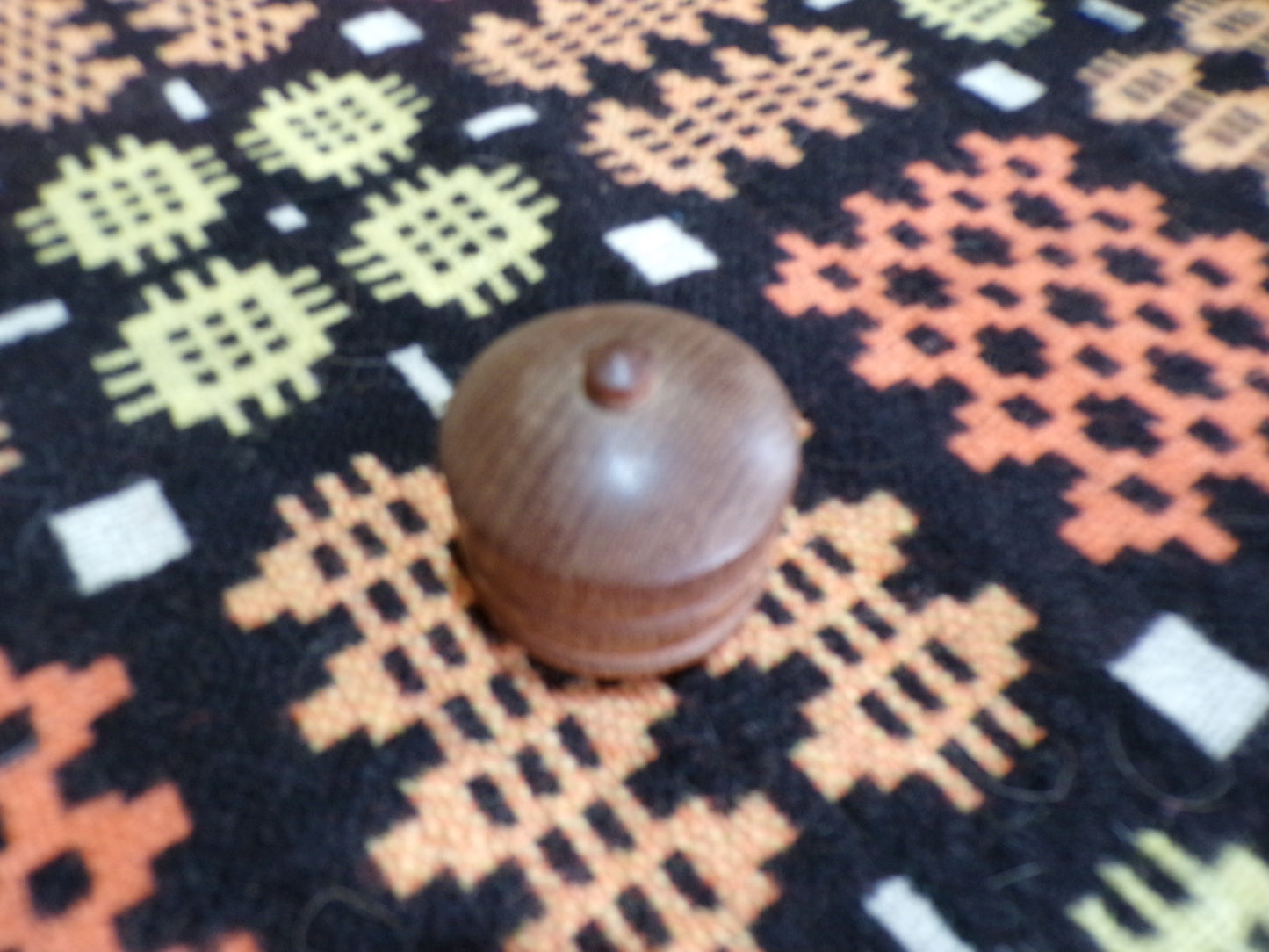 Two treen items - one a small match holder and the other a carved lidded pot