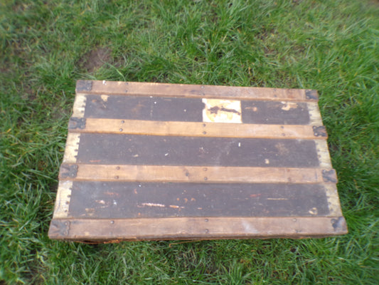 Vintage steamer trunk with flat lid
