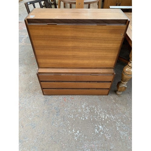 A mid century Beaver and Tapley teak wall mountable cocktail cabinet