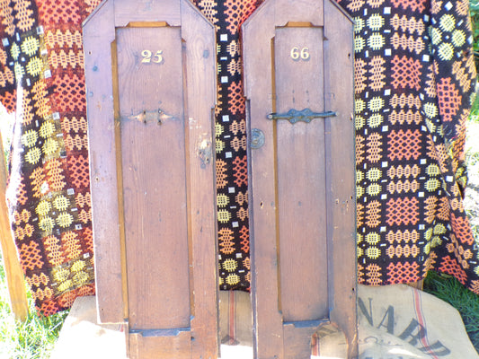 Pitch pine church pew ends with painted numbers