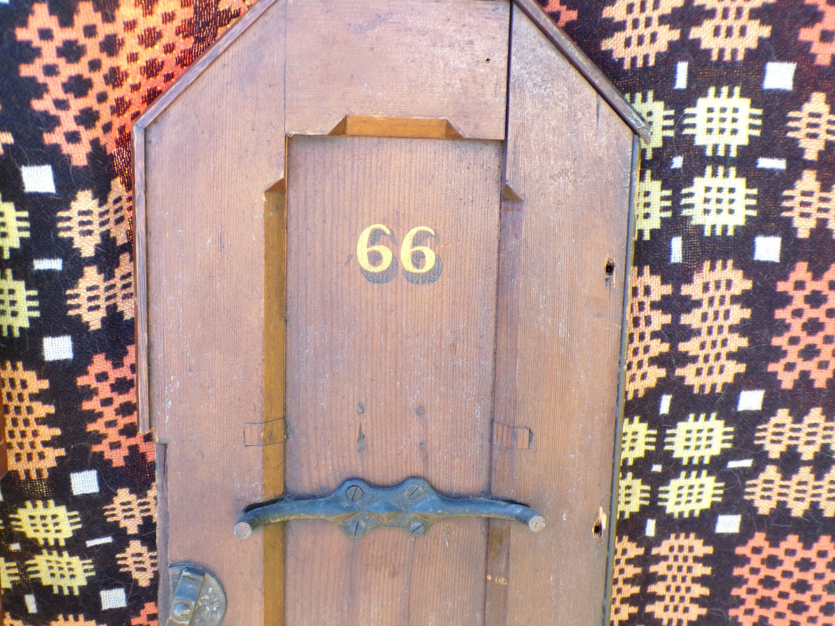 Pitch pine church pew ends with painted numbers