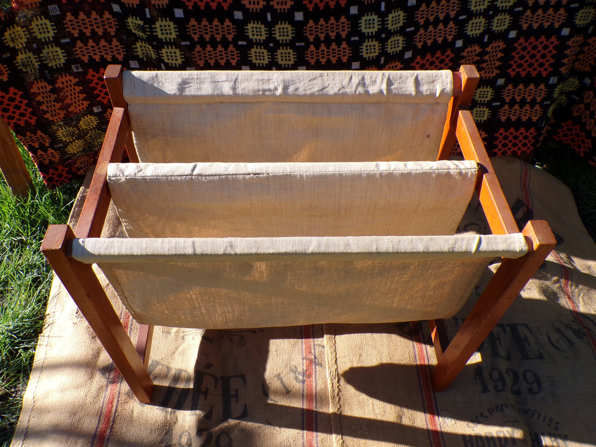 Mid century Danish teak and canvas magazine rack