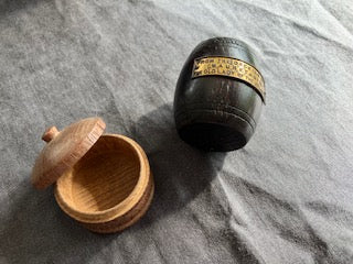 Two vintage pieces of treen. One like a snuff box - although dated to the thirties, and the other a match holder