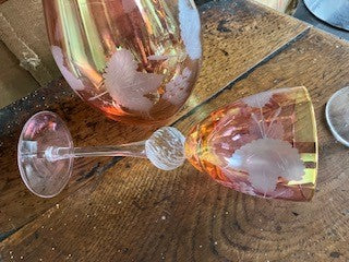 Three set Murano red and gold lustre mid century caraffe and wine glass set.